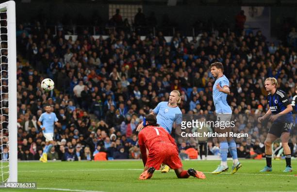 Erling Haaland of Manchester City scores their team's second goal past Kamil Grabara of FC Copenhagen during the UEFA Champions League group G match...