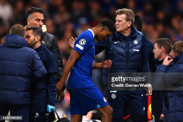 Wesley Fofana of Chelsea leaves the pitch due to injury during the UEFA Champions League group E match between Chelsea FC and AC Milan at Stamford...