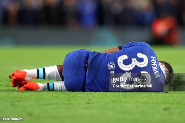 Wesley Fofana of Chelsea is seen injured during the UEFA Champions League group E match between Chelsea FC and AC Milan at Stamford Bridge on October...