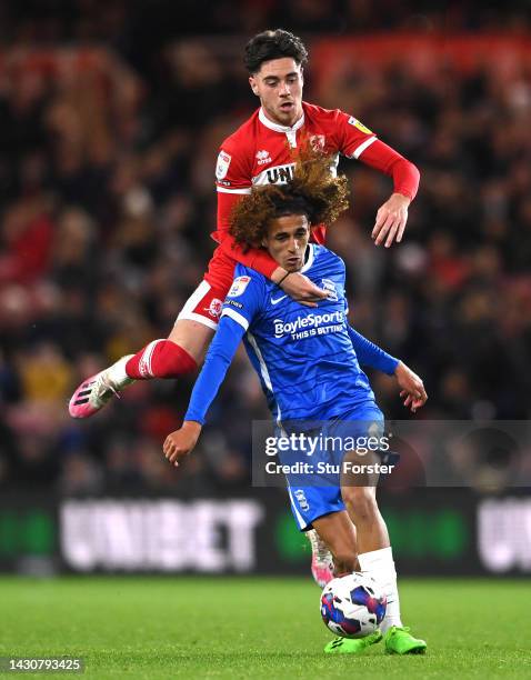 Birmingham player Hannibal Mejbri is challenged by Middlesbrough player Hayden Hackney during the Sky Bet Championship between Middlesbrough and...