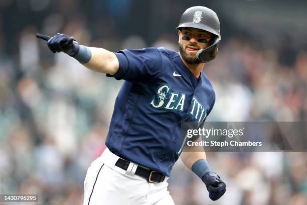 Mitch Haniger of the Seattle Mariners celebrates his home run against the Detroit Tigers during the first inning at T-Mobile Park on October 05, 2022...