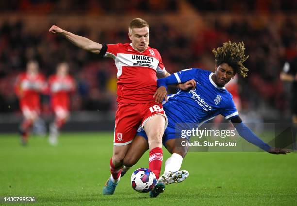 Birmingham player Dion Sanderson challenges Middlesbrough player Duncan Watmore during the Sky Bet Championship between Middlesbrough and Birmingham...