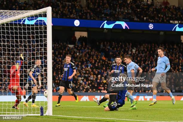 Julian Alvarez of Manchester City scores their team's fifth goal during the UEFA Champions League group G match between Manchester City and FC...