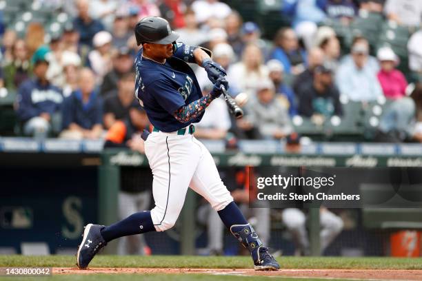 Julio Rodriguez of the Seattle Mariners hits a home run during the first inning against the Detroit Tigers at T-Mobile Park on October 05, 2022 in...