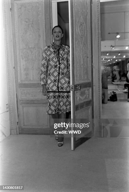Designer Emanuel Ungaro presents his fall 1973 couture collection to a small audience of guests gathered inside his Paris atelier.