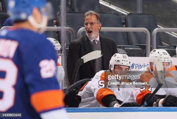 Head coach John Tortorella of the Philadelphia Flyers handles the bench against the New York Islanders at the UBS Arena on October 02, 2022 in...
