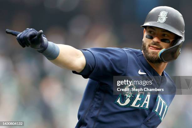 Mitch Haniger of the Seattle Mariners celebrates his home run against the Detroit Tigers during the first inning at T-Mobile Park on October 05, 2022...