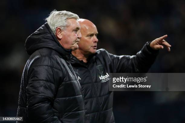 Steve Bruce, Manager of West Bromwich Albion speaks with Steve Agnew, Assistant Manager of West Bromwich Albion during the Sky Bet Championship...