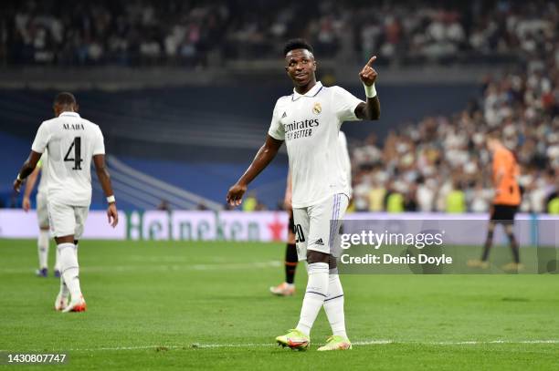 Vinicius Junior of Real Madrid celebrates after scoring their team's second goal during the UEFA Champions League group F match between Real Madrid...