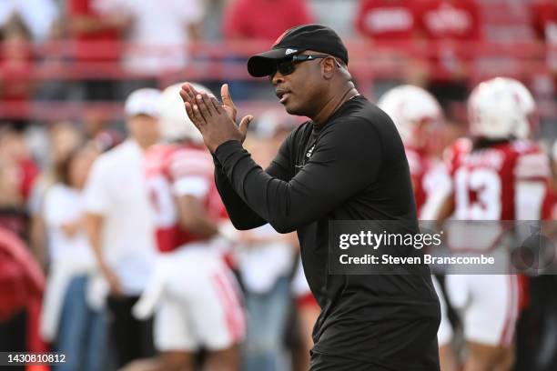 Interim head coach Mickey Joseph of the Nebraska Cornhuskers watches the team warm up before the game against the Indiana Hoosiers at Memorial...