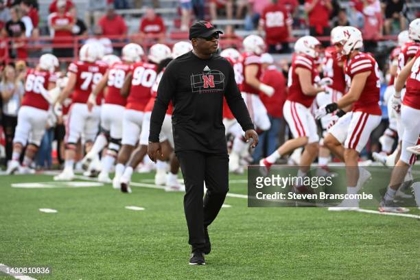 Interim head coach Mickey Joseph of the Nebraska Cornhuskers watches the team warm up before the game against the Indiana Hoosiers at Memorial...