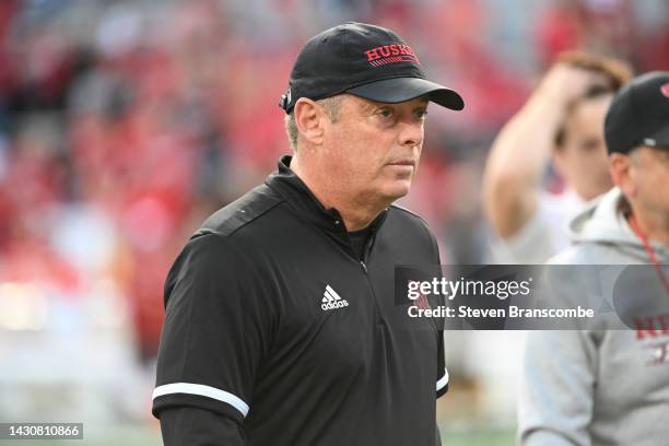 Assistant coach Bill Busch of the Nebraska Cornhuskers watches the team warm up before the game against the Indiana Hoosiers at Memorial Stadium on...