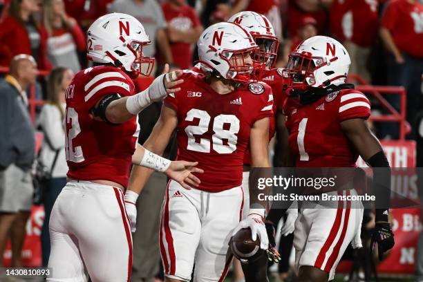 Linebacker Luke Reimer of the Nebraska Cornhuskers celebrates an interception against the Indiana Hoosiers during the third quarter at Memorial...