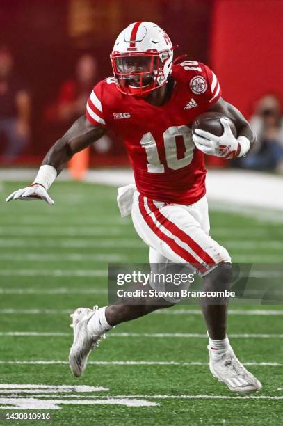 Running back Anthony Grant of the Nebraska Cornhuskers runs against the Indiana Hoosiers during the third quarter at Memorial Stadium on October 1,...