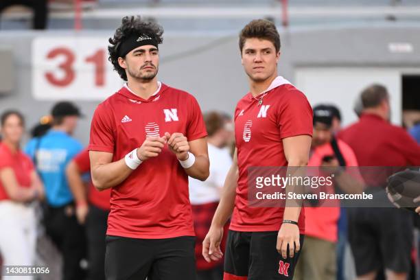 Quarterback Chubba Purdy of the Nebraska Cornhuskers and quarterback Logan Smothers on the field before the game against the Indiana Hoosiers at...