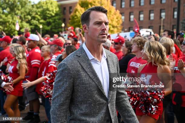 Assistant coach Barrett Ruud of the Nebraska Cornhuskers greets fans before the game against the Indiana Hoosiers at Memorial Stadium on October 1,...