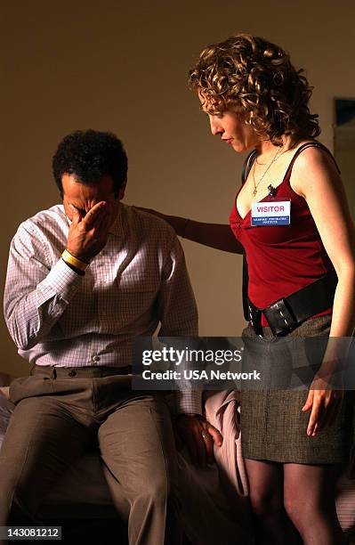 Mr. Monk Goes to Asylum" Episode -- Pictured: Tony Shalhoub as Adrian Monk, Bitty Schram as Sharona Fleming --