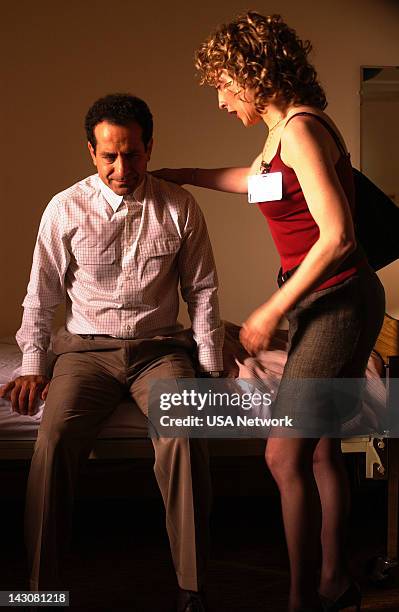 Mr. Monk Goes to Asylum" Episode -- Pictured: Tony Shalhoub as Adrian Monk, Bitty Schram as Sharona Fleming --