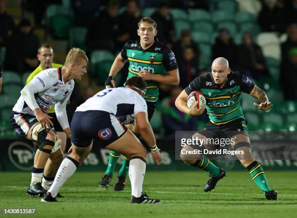 Aaron Hinkley of Northampton Saints charges upfield during the Premiership Rugby Cup match between Northampton Saints and Saracens at Franklin's...