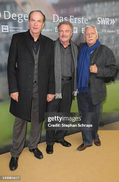 Actor Herbert Knaup, director Jo Baier and Silver Hesse attend the premiere of 'Die Heimkehr' at Astor Film Lounge movie theater, Kurfuerstendamm, on...