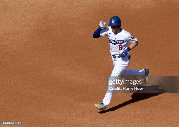 Trea Turner of the Los Angeles Dodgers celebrates his three run homerun, to take a 4-1 lead over the Colorado Rockies, during the fifth inning at...