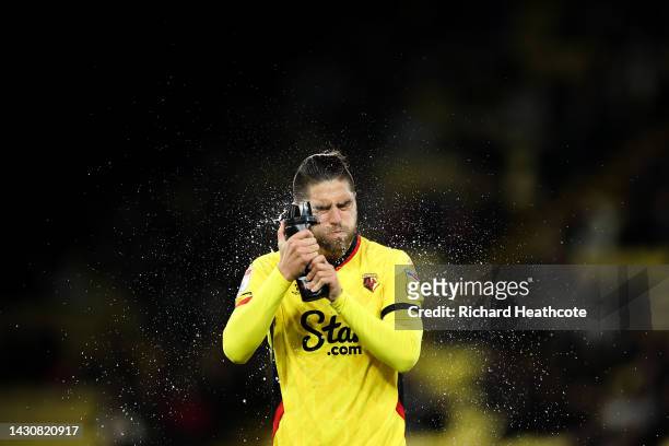 Francisco Sierralta of Watford sprays water on his face during the Sky Bet Championship between Watford and Swansea City at Vicarage Road on October...