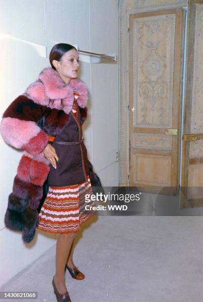 Designer Emanuel Ungaro presents his fall 1973 couture collection to a small audience of guests gathered inside his Paris atelier.