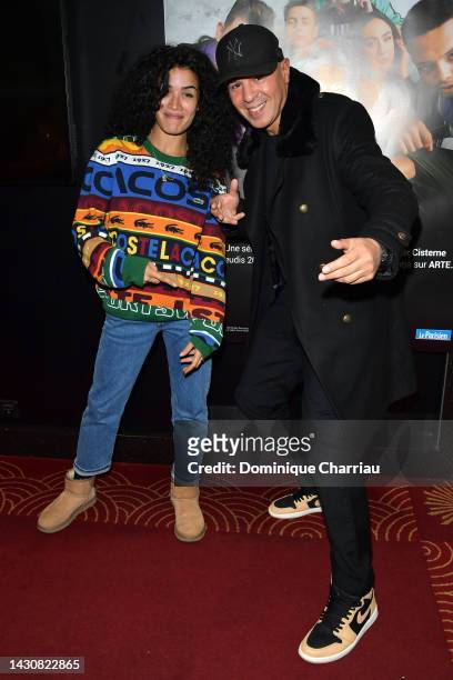 Sabrina Ouazani and DJ Cut Killer attend "Le Monde De Demain" premiere at Le Grand Rex on October 05, 2022 in Paris, France.