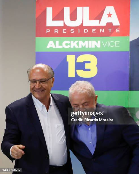 Vice presidential candidate Geraldo Alckmin hugs running mate Luiz Inacio Lula da Silva of Workers' Party during a meeting with leaders of different...