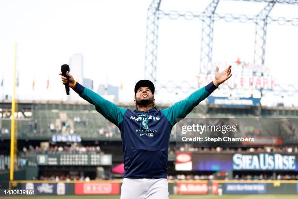 Eugenio Suarez of the Seattle Mariners addresses the crowd after beating the Detroit Tigers 5-4 at T-Mobile Park on October 05, 2022 in Seattle,...