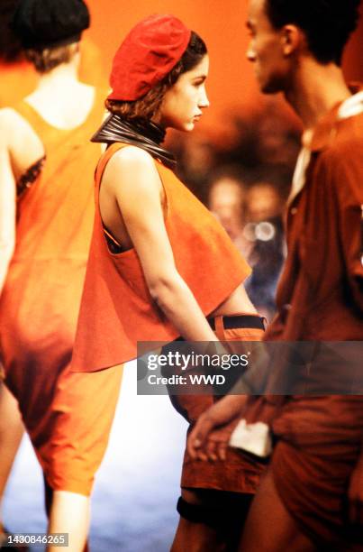 Model walks the runway in Jean Paul Gaultier spring 1985 coed runway show at the Cirque de River on October 22 in Paris.