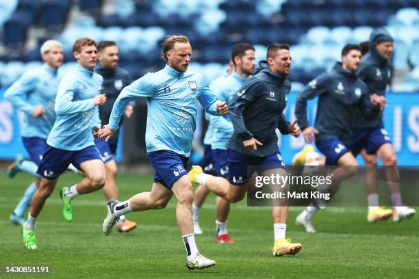 Rhyan Grant warms up with team mates during a Sydney FC A-League training session at Allianz Stadium on October 06, 2022 in Sydney, Australia.