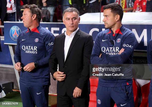 Coach of PSG Christophe Galtier between his assistants Thierry Oleksiak and Joao Sacramento during the UEFA Champions League group H match between SL...