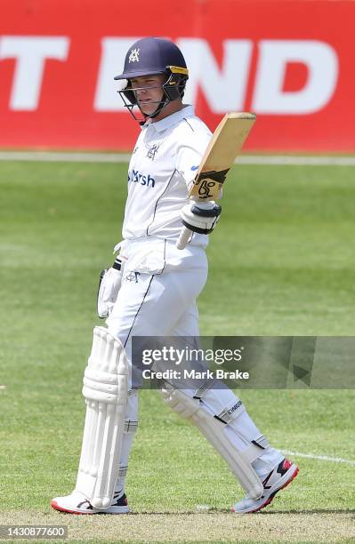 Marcus Harris of the Bushrangers celebrates making his half century during the Sheffield Shield match between South Australia and Victoria at Karen...