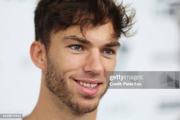 Pierre Gasly of France and Scuderia AlphaTauri talks to the media in the Paddock during previews ahead of the F1 Grand Prix of Japan at Suzuka...