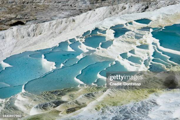 natural view on travertine pools and terraces in pamukkale. cotton castle in southwestern turkey - pamukkale stock pictures, royalty-free photos & images