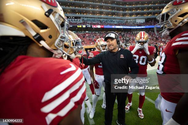 Special Teams Coordinator Brian Schneider of the San Francisco 49ers with the special teams unit on the sideline during the game against the Los...
