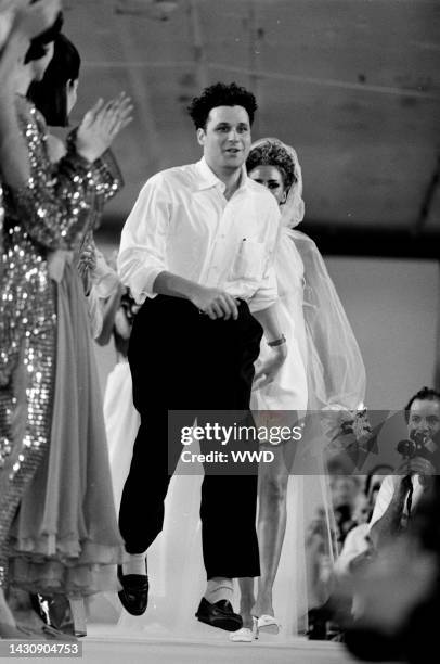 Designer Isaac Mizrahi takes a bow during the finale.