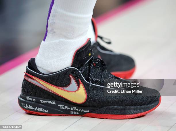 LeBron James of the Los Angeles Lakers wears Nike shoes in the second quarter of a preseason game against the Phoenix Suns at T-Mobile Arena on...