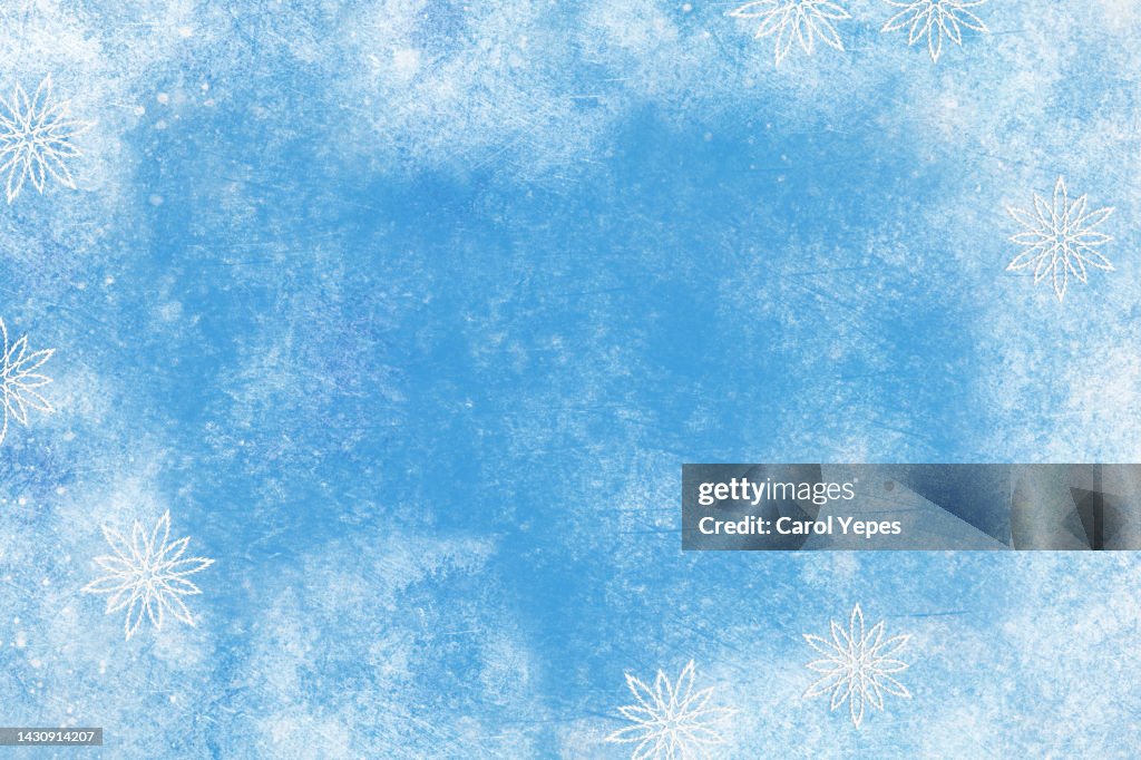 Snowflakes frame in pastel blue paper cut