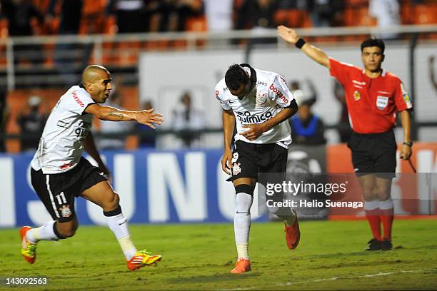 Liedson of Corinthians celebrates with team mates after scoring against Deportivo Táchira during a match as part of Santander Libertadores Cup 2012,...