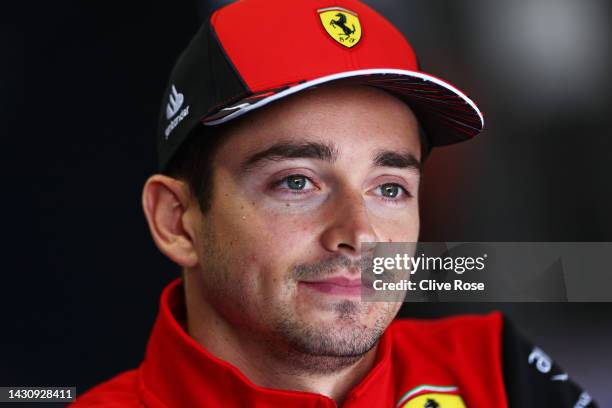 Charles Leclerc of Monaco and Ferrari talks to the media in the Paddock during previews ahead of the F1 Grand Prix of Japan at Suzuka International...