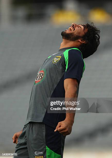 Johnathan Thurston of the Kangaroos laughs during the Australian Kangaroos captain's run at Eden Park on April 19, 2012 in Auckland, New Zealand.