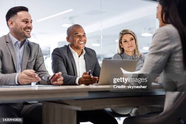 happy human resource team having a job interview with their candidate. - happy candidate stock pictures, royalty-free photos & images