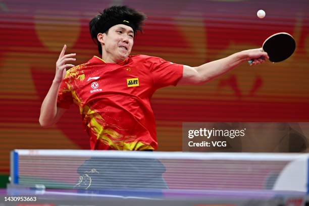 Wang Chuxin of China competes against Shah Manush Utpalbhai of India during the Men's Round of 16 match between China and India on Day 7 of 2022 ITTF...