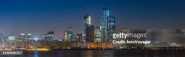 south korea yeouido financial district skyscrapers glittering night panorama seoul - yeouido stock pictures, royalty-free photos & images