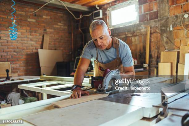 Man Using Saw 7,527 Man Using Circular Saw Stock Photos, High-Res Pictures, and ...