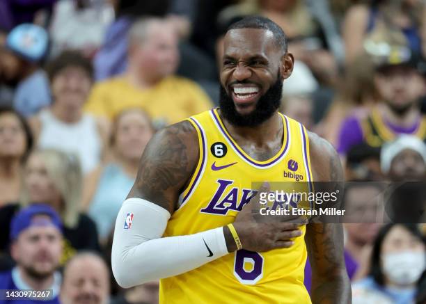 LeBron James of the Los Angeles Lakers laughs on the court in the second quarter of a preseason game against the Phoenix Suns at T-Mobile Arena on...