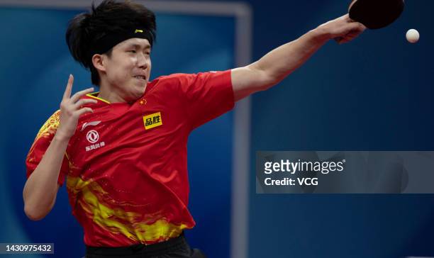 Wang Chuqin of China competes against Shah Manush Utpalbhai of India during the Men's Round of 16 match between China and India on Day 7 of 2022 ITTF...