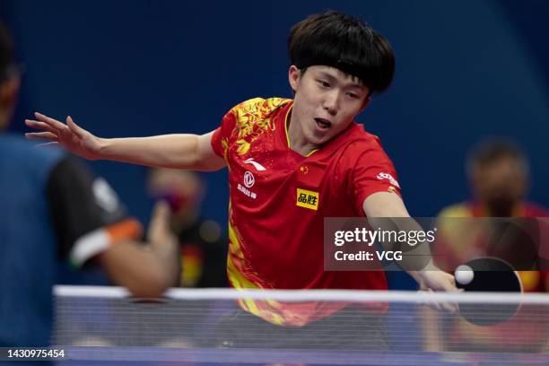 Wang Chuqin of China competes against Shah Manush Utpalbhai of India during the Men's Round of 16 match between China and India on Day 7 of 2022 ITTF...